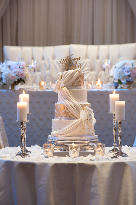 cake table w:silver candle holders:cake stand:votives
